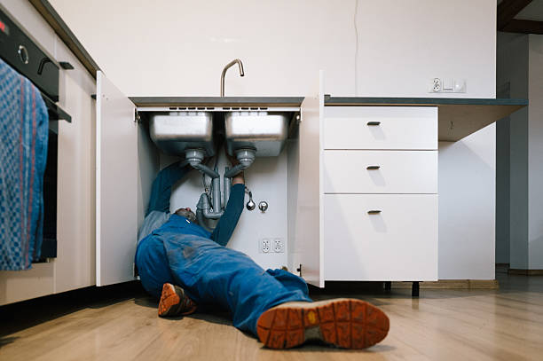 Professional Emergency Plumber technician working in Columbia Station, OH